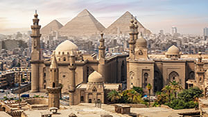 The Mosque of Sultan Hassan and the Great Pyramids of Giza, Cairo skyline, Egypt